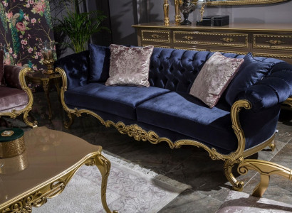 Chesterfield three-seater sofa in luxurious blue color for the living room